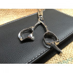 lightened scissor with a ergonomic handles.design. Japanese made.